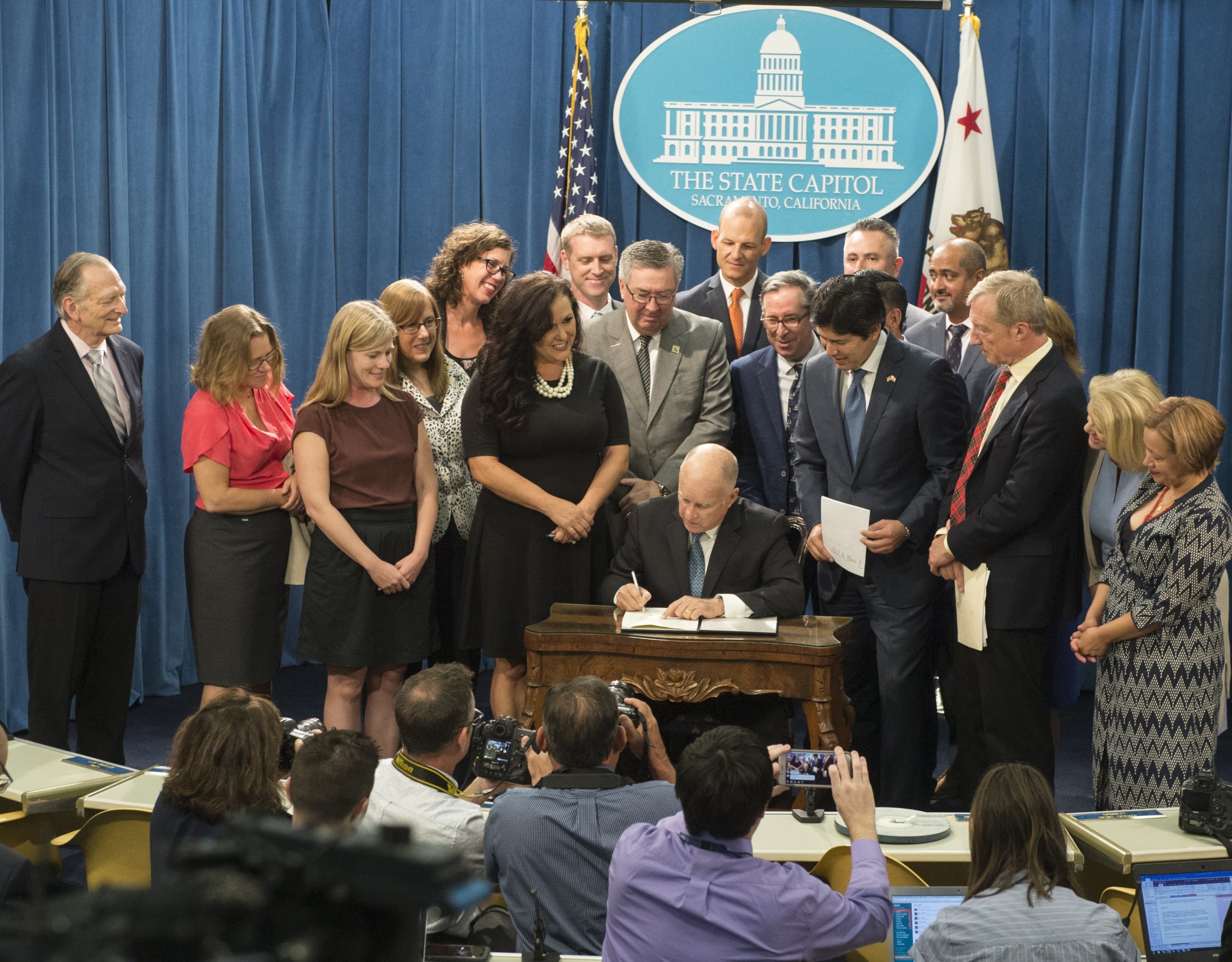 State Policy Champ Gov Brown signs SB 100